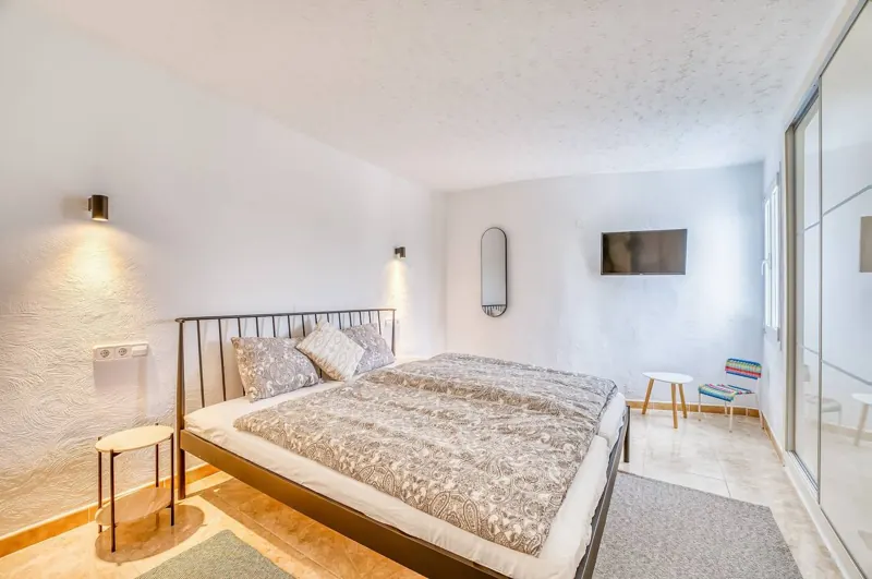 Double bedroom with a double bed and built-in wardrobe