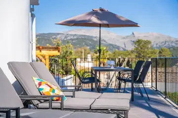 The sun-lounger terrace, facing the Serra de Tramuntana