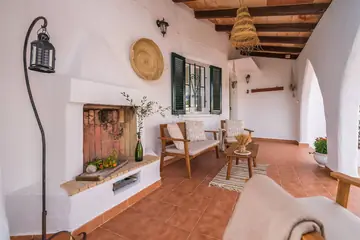 The stone fireplace on the porch